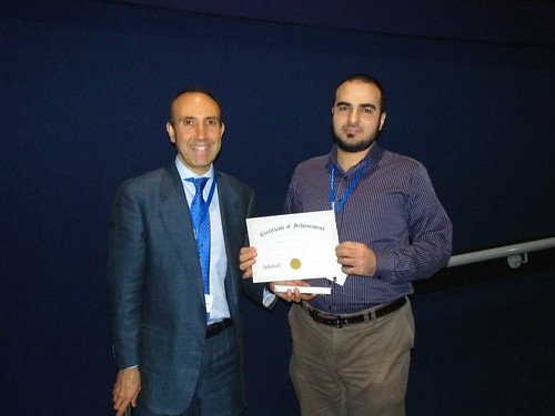 			Euroscicon posted a photo:	Professor Consolato Sergi and poster prize winner Dr Alhadi Almangush